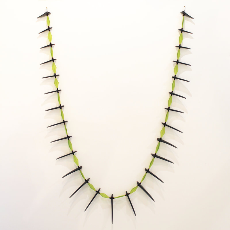 Jenny McLeod, "Charcoal Tusk Wall Necklace", Glass, Resin, Wood and Copper, 750 w x 1220mm H, 2023, SOLD