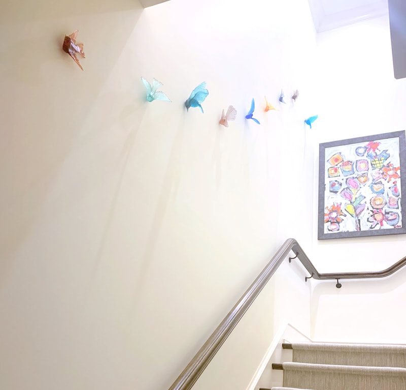 Lukeke Design | Glass Bird Flock Display in Stairwell