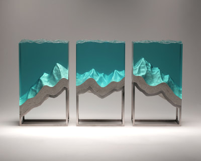 Ben Young, "Stormy Sections", Laminated clear float glass with cast concrete and stainless steel frame. Internal lit. H 425 x W 250 x D 150mm (each piece), SOLD