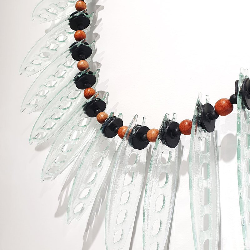 Jenny McLeod, "Black and Tan Seedpod- Wall Necklace (Detail)", Glass, Rubber and Wooden Beads, 600 x 800mm, 2023