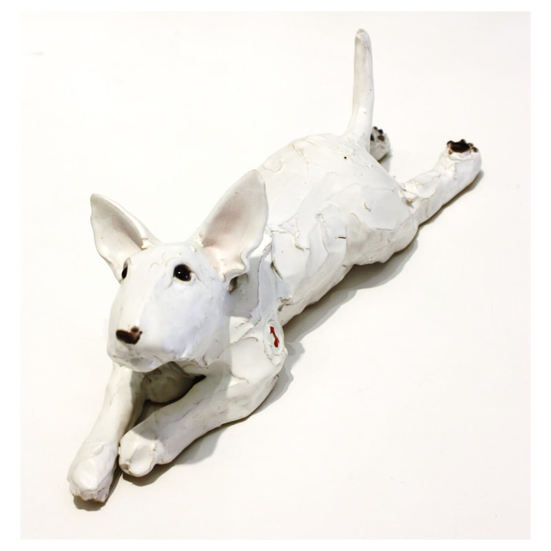 Kylie Matheson- "Bully Pup (Lying)", Ceramic Sculpture, 340 x 120 x 100mm, 2022