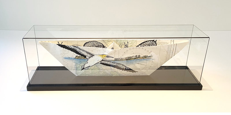 Philippa Bentley, "Gannet at Motuihe and Adventurer", Screenprint and painting on chart in glass display case, 180 x 600 x 140mm, 2020